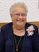 Joan  Djos